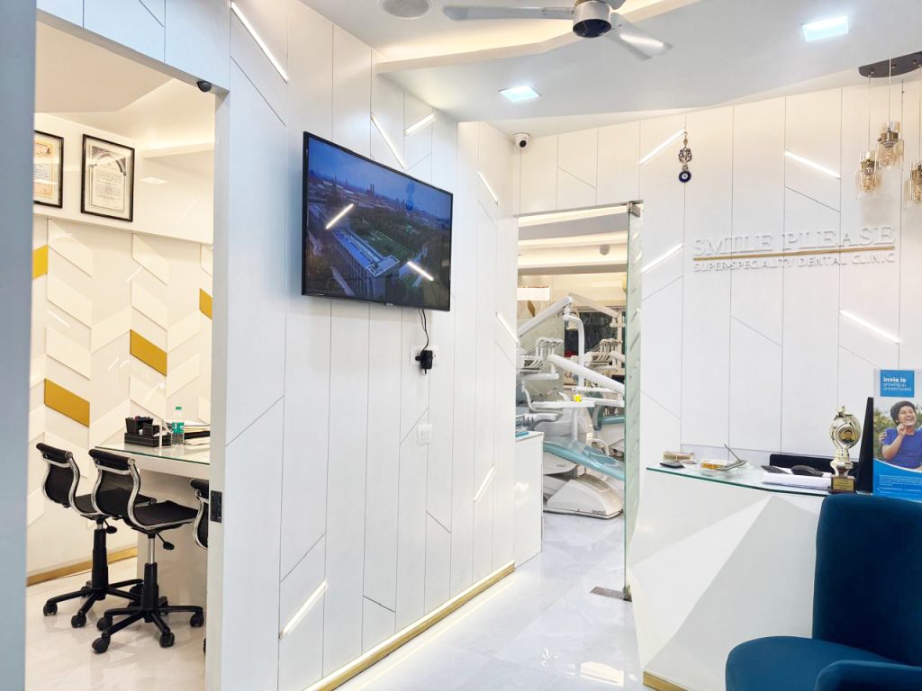 Modern premium reception area at Smile Please Dental Clinic in Navi Mumbai designed for a comfortable and advanced dental care experience. 19.073180118660364, 72.99863463398478